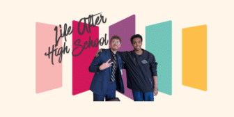 May contain two people, one in a suit, one in a jacket, in front of colorful panels and text.